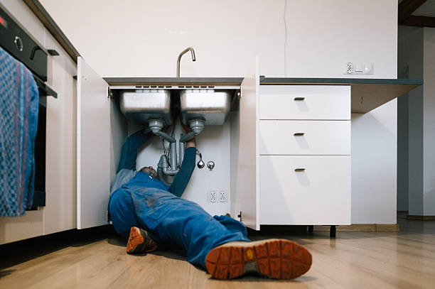 Professional Plumbing technician working in Patoka, IN